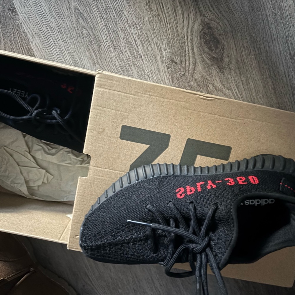 Yeezy Black and Red Athletic Shoes